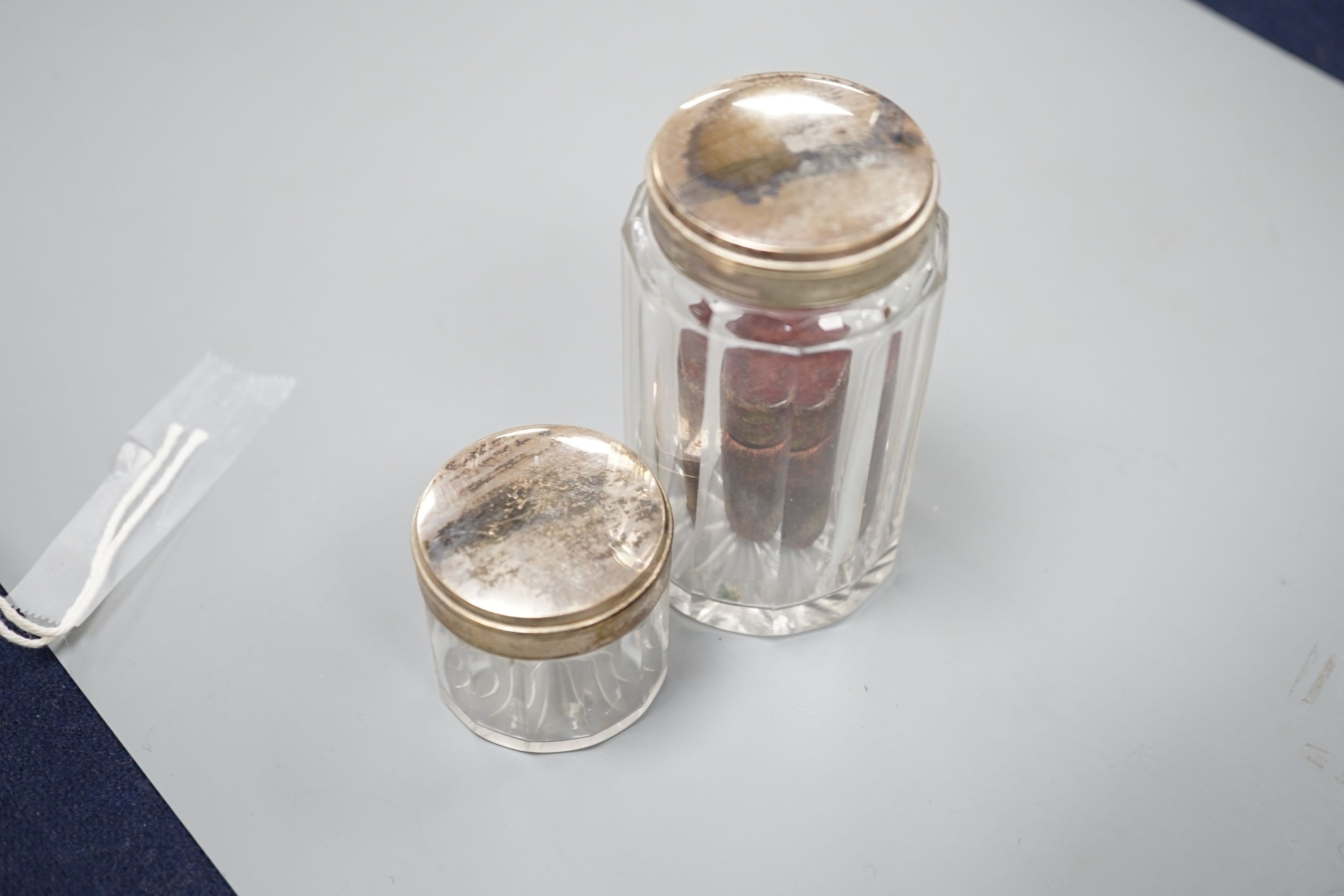 A Victorian brass mounted burr walnut toilet box, fitted with glass jars with electroplated tops, Width 30 cms. Ivory mounted items included